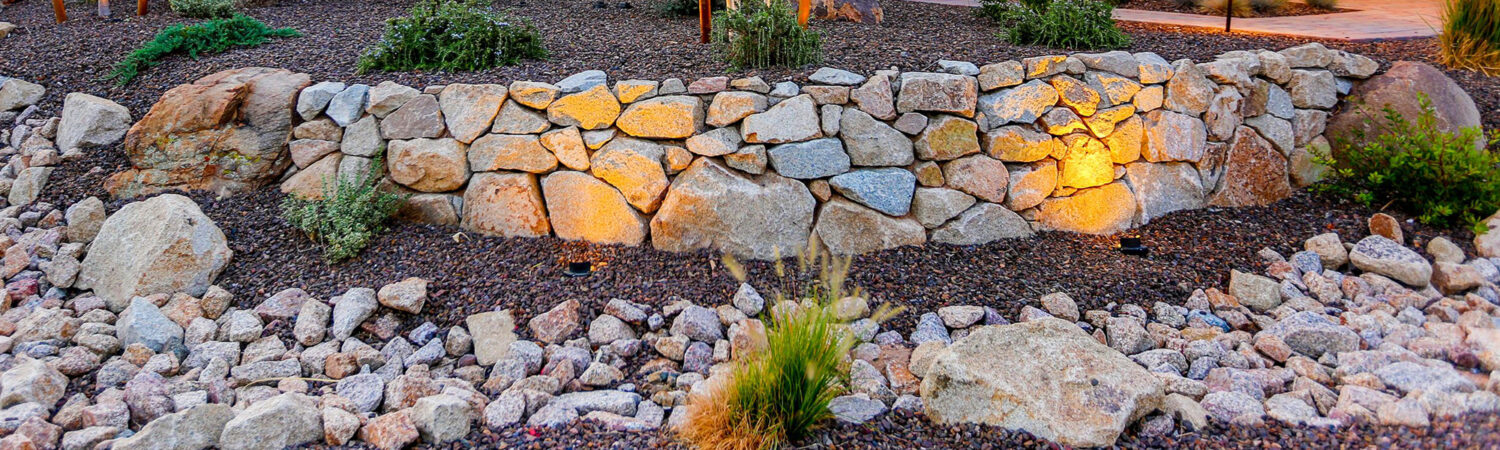 Unique Rock Walls and Paths can enhance your yard.